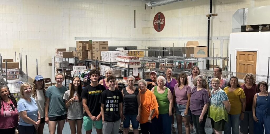 Volunteers at Wales Community Pantry Summer photo after the move in August 2025.