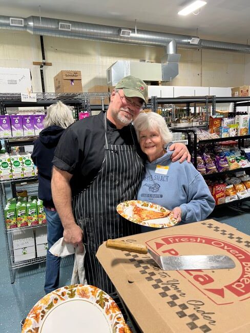 Mr. Rovezzi, the pizza man and a dedicated volunteer!