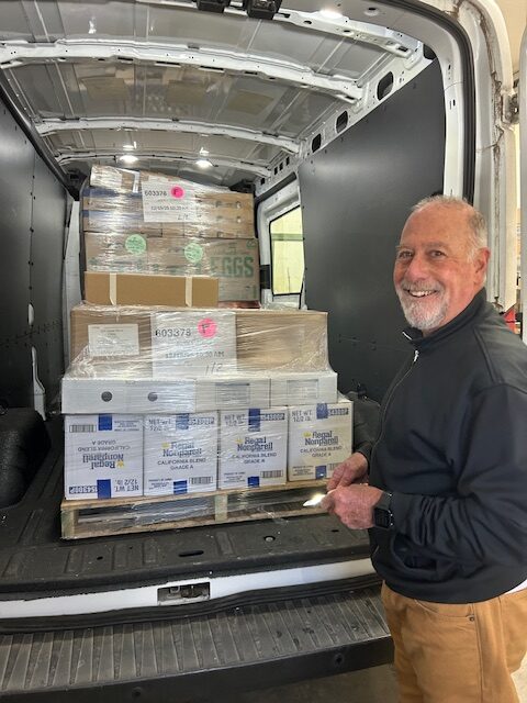 Fresh food for the Wales Community Pantry and a happy volunteer. 12-15-2025